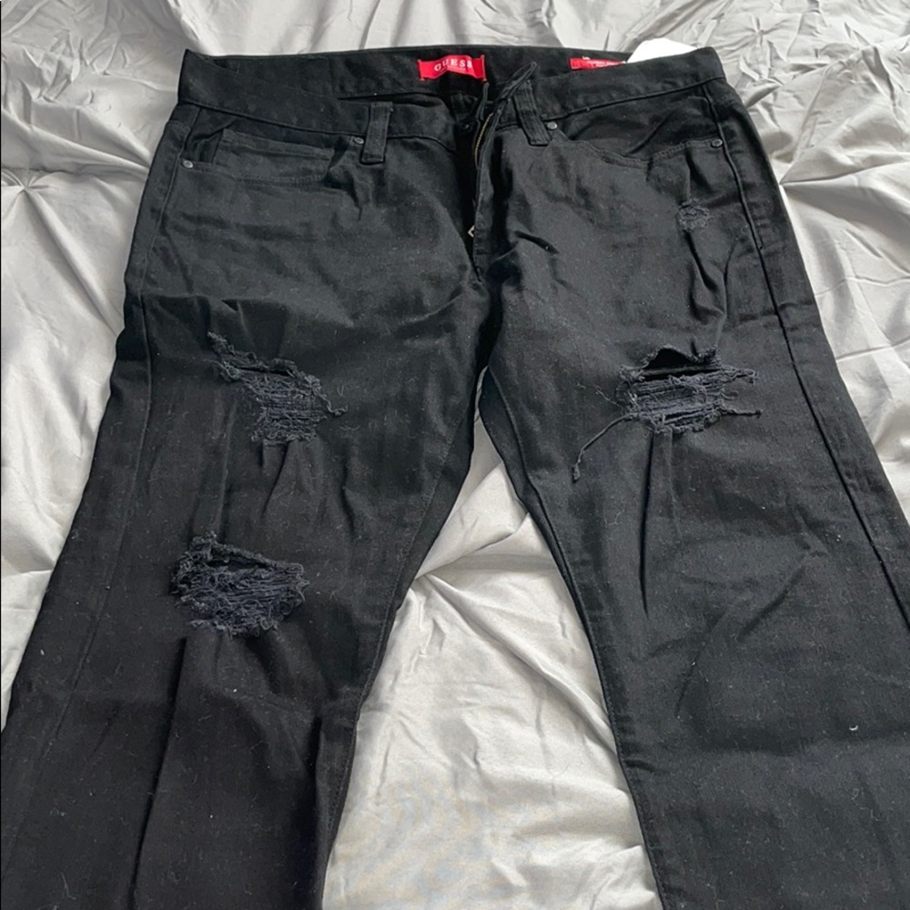 Guess men’s destroyed jeans